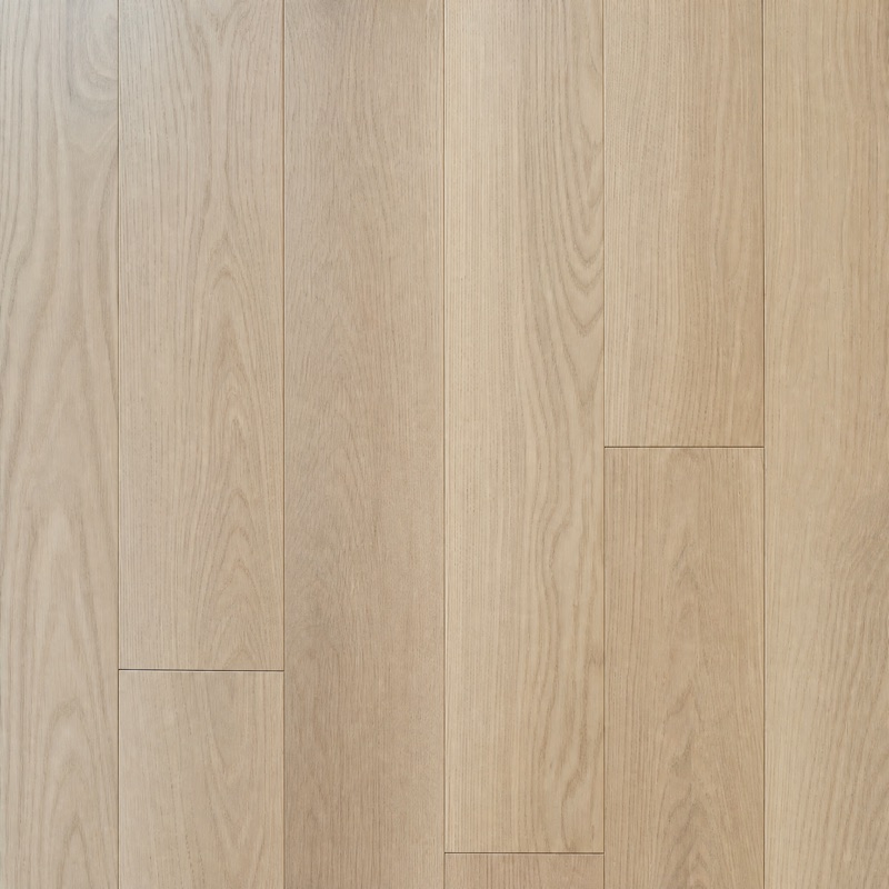 Straight-down view of pale ash floorboards with quiet linear grain