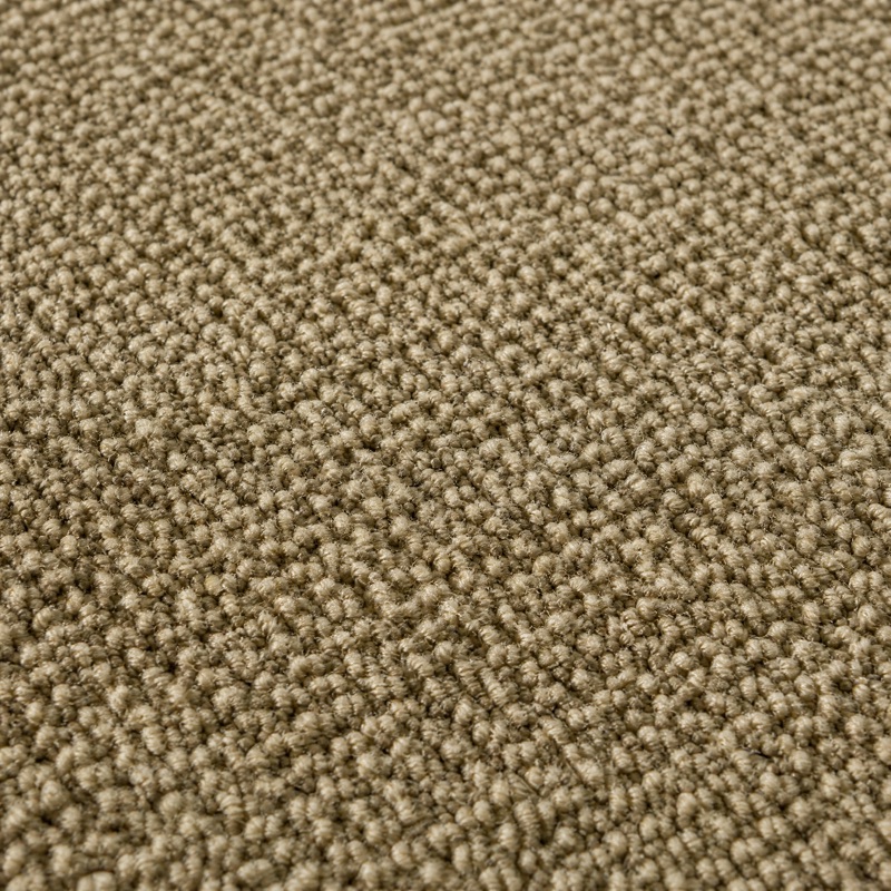 Straight-down view of warm taupe textured loop-pile carpet