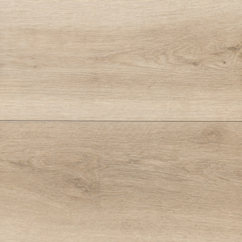 Straight-down view of pale driftwood luxury vinyl plank with soft linear grain