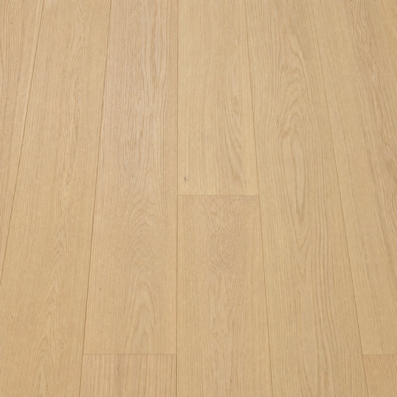 Straight-down view of light white oak floorboards with subtle grain